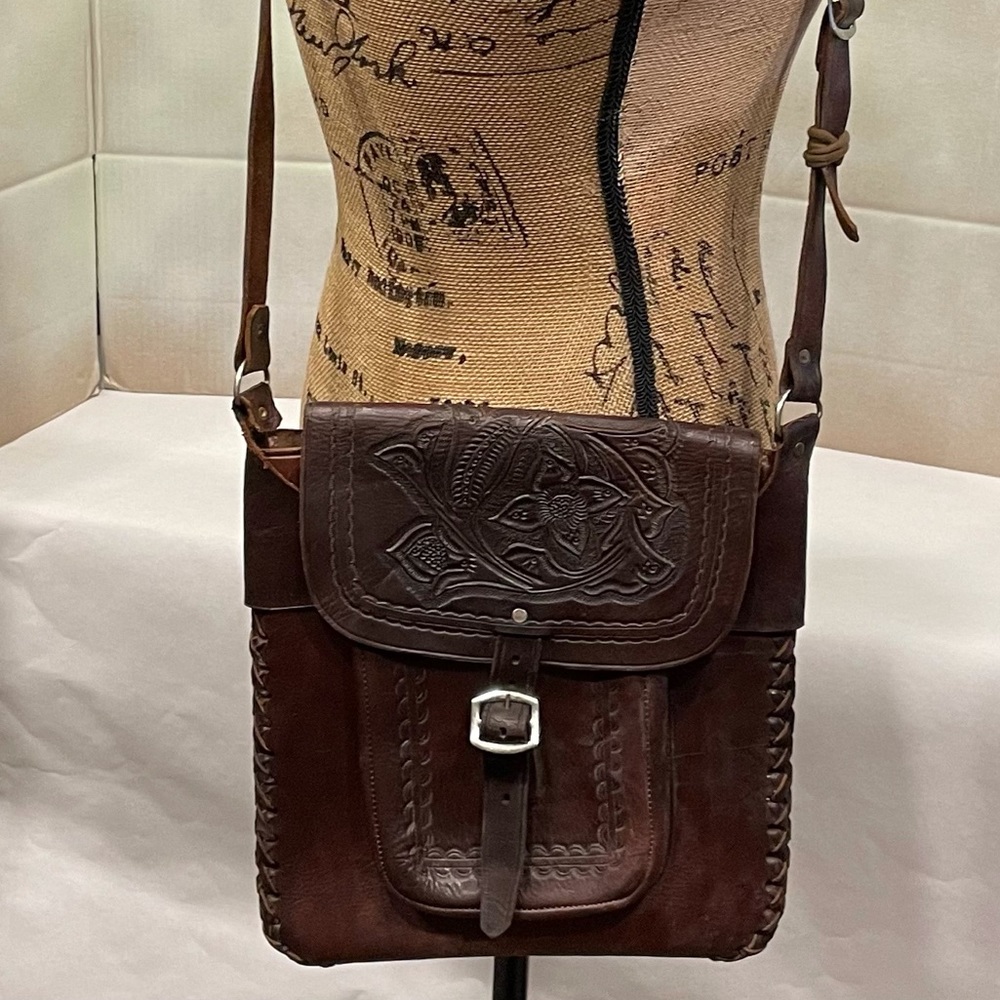 Brown embossed leather hand bag